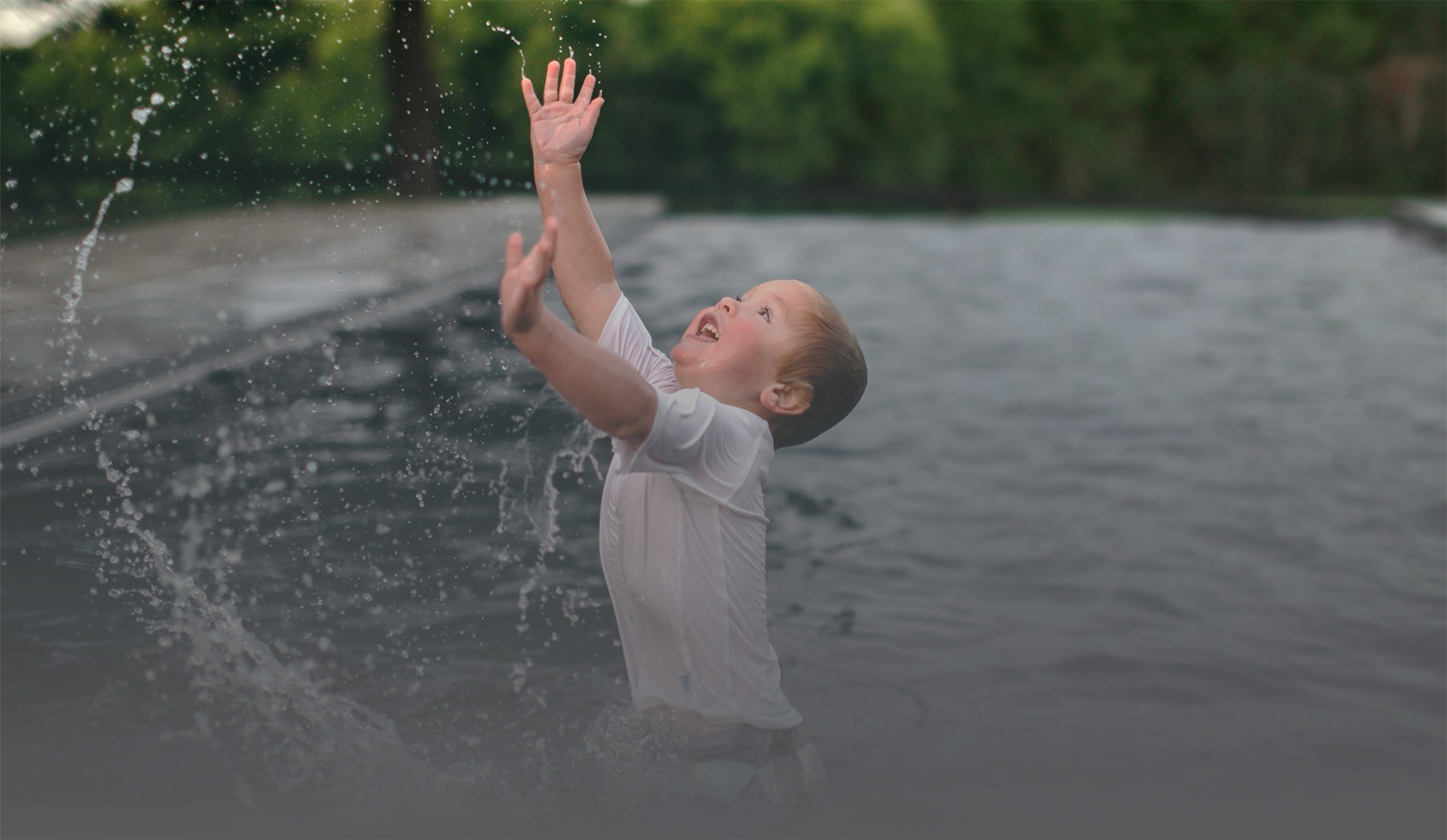 Imagine Pools Boy Playing In Pool Sunkissed Pools: Mississippi's Top Fiberglass Pool Builder